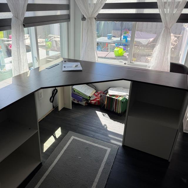 L-shaped corner desk, assembled in a home office